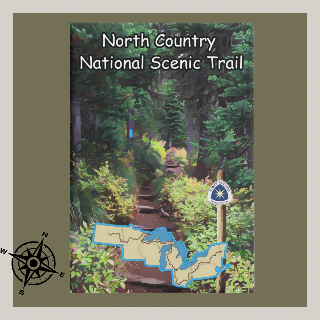 Metal button magnet depicting a narrow hiking trail through the woods and a map of the North Country Trail.