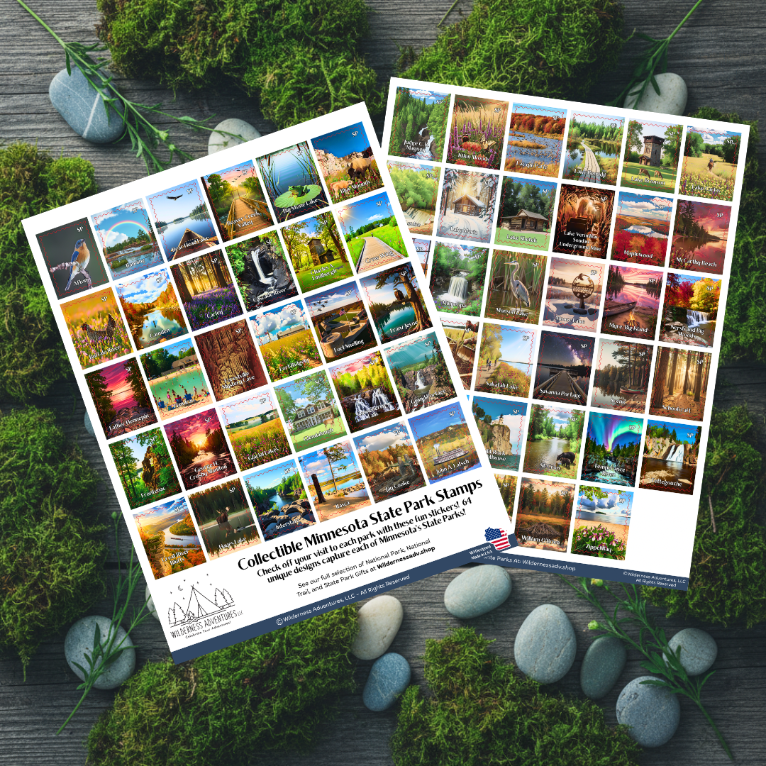 Two printed collectible stamp sheets featuring Minnesota state park scenes, arranged on a mossy wooden surface with stones and small greenery. The sheets show many colorful landscape photos and the title 'Collectible Minnesota State Park Stamps' along the bottom.