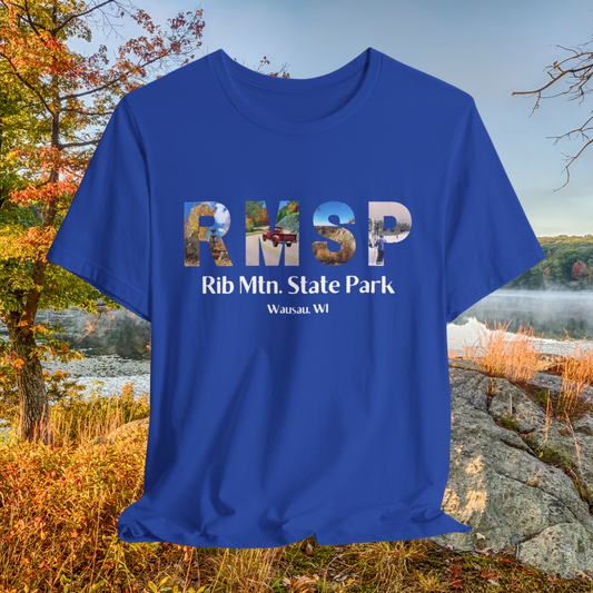 RMSP shirt in true royal depicting the letters RMSP, each with a different park scene.  Photo background: trees in fall leaf cover around a calm lake.