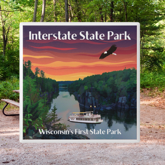 Ceramic coaster featuring a beautiful sunset over the St Croix with the text Interstate State Park.  Photo background: campsite in the woods.
