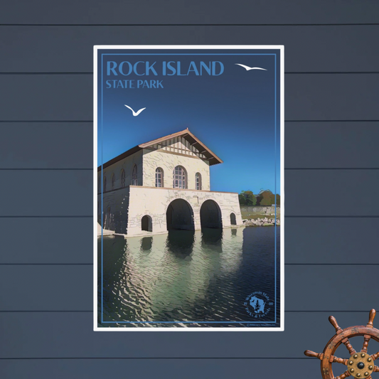 Poster depicting the rock boathouse at Rock Island State Park with seagulls flying above, and the text Rock Island State Park.  Photo Background: blue shiplap wall and ship wheel.