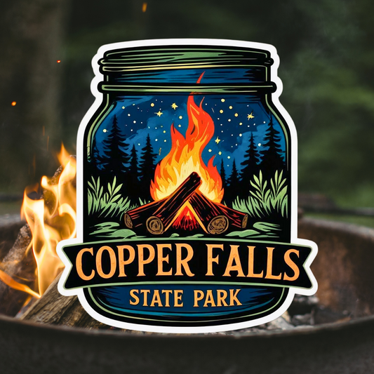 Mason jar shaped sticker with a starry night and campfire scene and the text Copper Falls State Park.