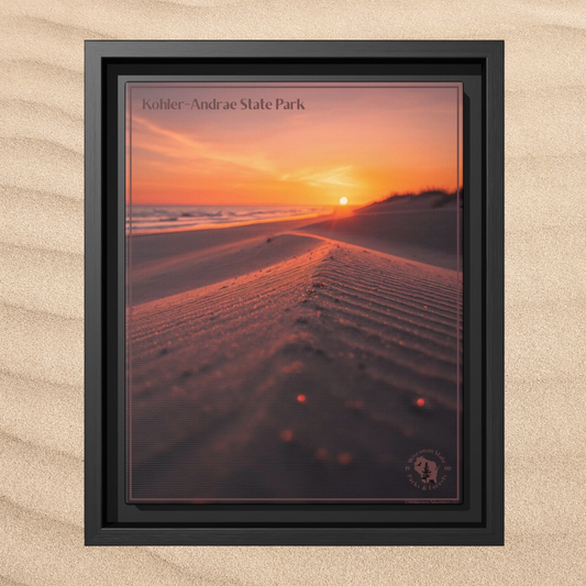 Framed wall print featuring an image of looking down a sand dune at a rising sun over a lake.  Photo background: ripples in the sand.