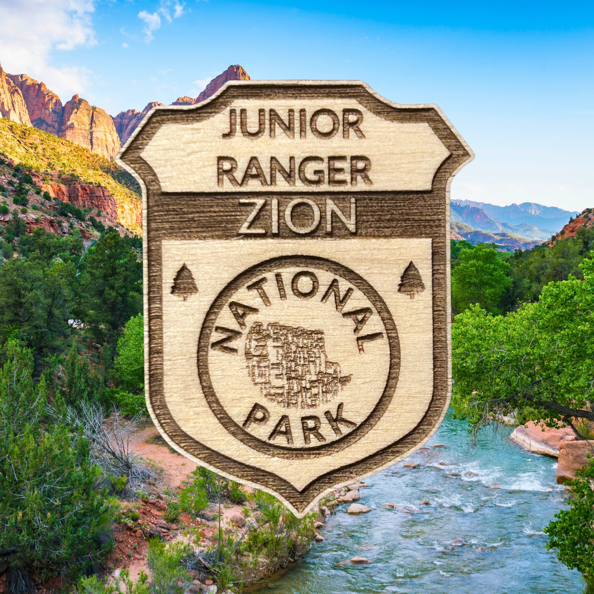 Wood Junior Ranger Zion National Park badge with a scenic background of mountains and river.
