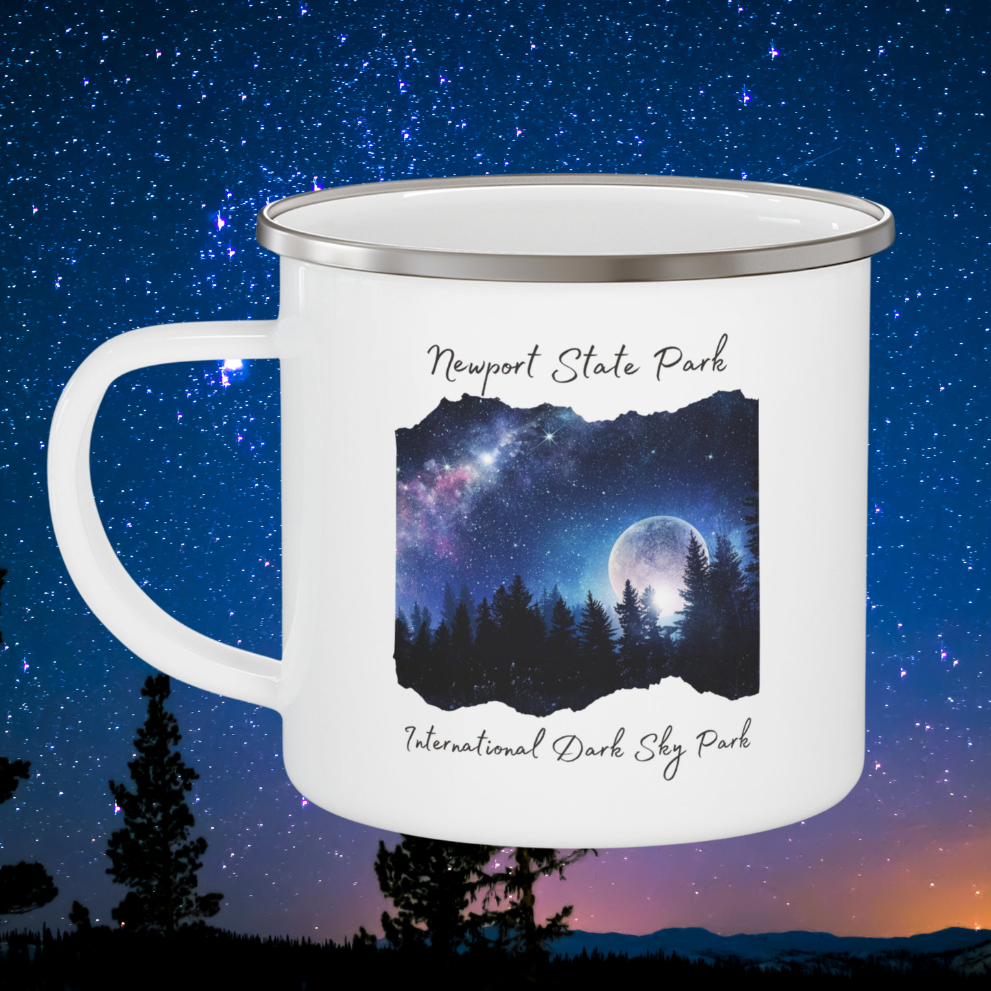 White mug with a design of a night sky over trees and text on a starry night background