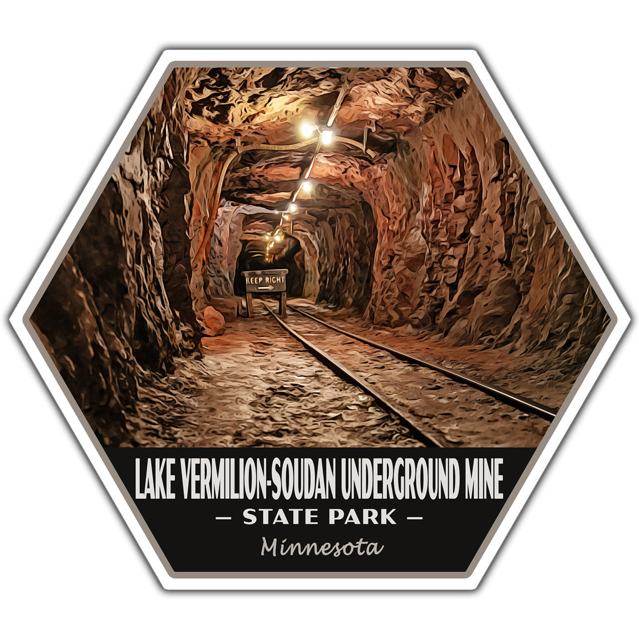 A hexagonal travel-style label or sticker featuring an interior view of a rocky underground mine with tracks and bright overhead lights. Text at the bottom reads “LAKE VERMILION-SOUDAN UNDERGROUND MINE,” “STATE PARK,” and “Minnesota.