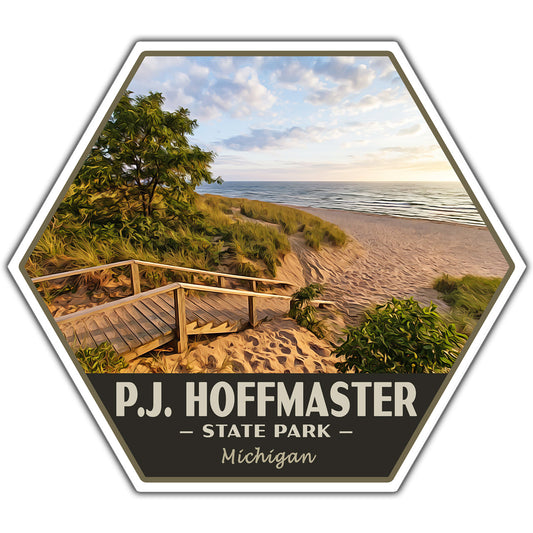 Hexagonal sticker of P.J. Hoffmaster State Park with a beach and wooden walkway.
