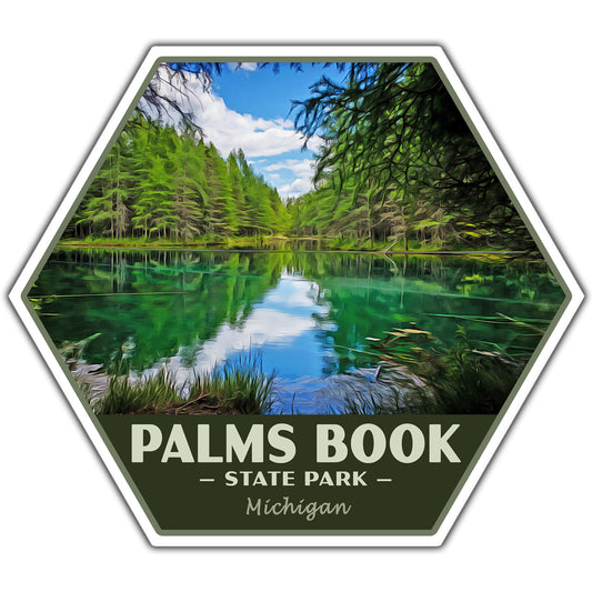 A hexagonal sticker featuring a scenic photograph of a calm lake surrounded by green pine trees under a blue sky, with the text 'PALMS BOOK STATE PARK Michigan' at the bottom.