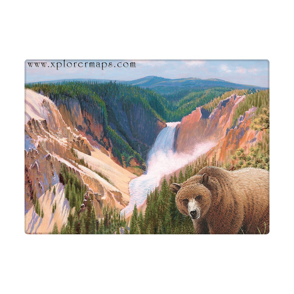 A rectangular magnet featuring a painted Yellowstone landscape with a waterfall, canyon cliffs, evergreen trees, and a brown bear in the foreground.