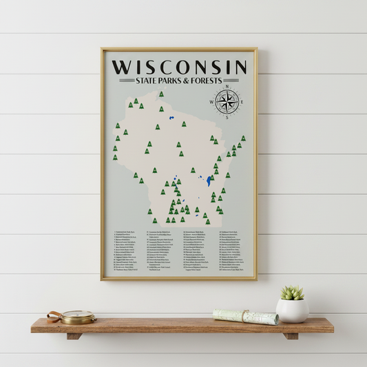 Framed poster map of Wisconsin State Parks and Forests on a wall with a wooden shelf below.