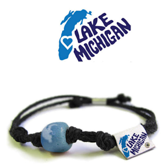Bracelet with a blue bead and 'Lake Michigan' tag on a white background