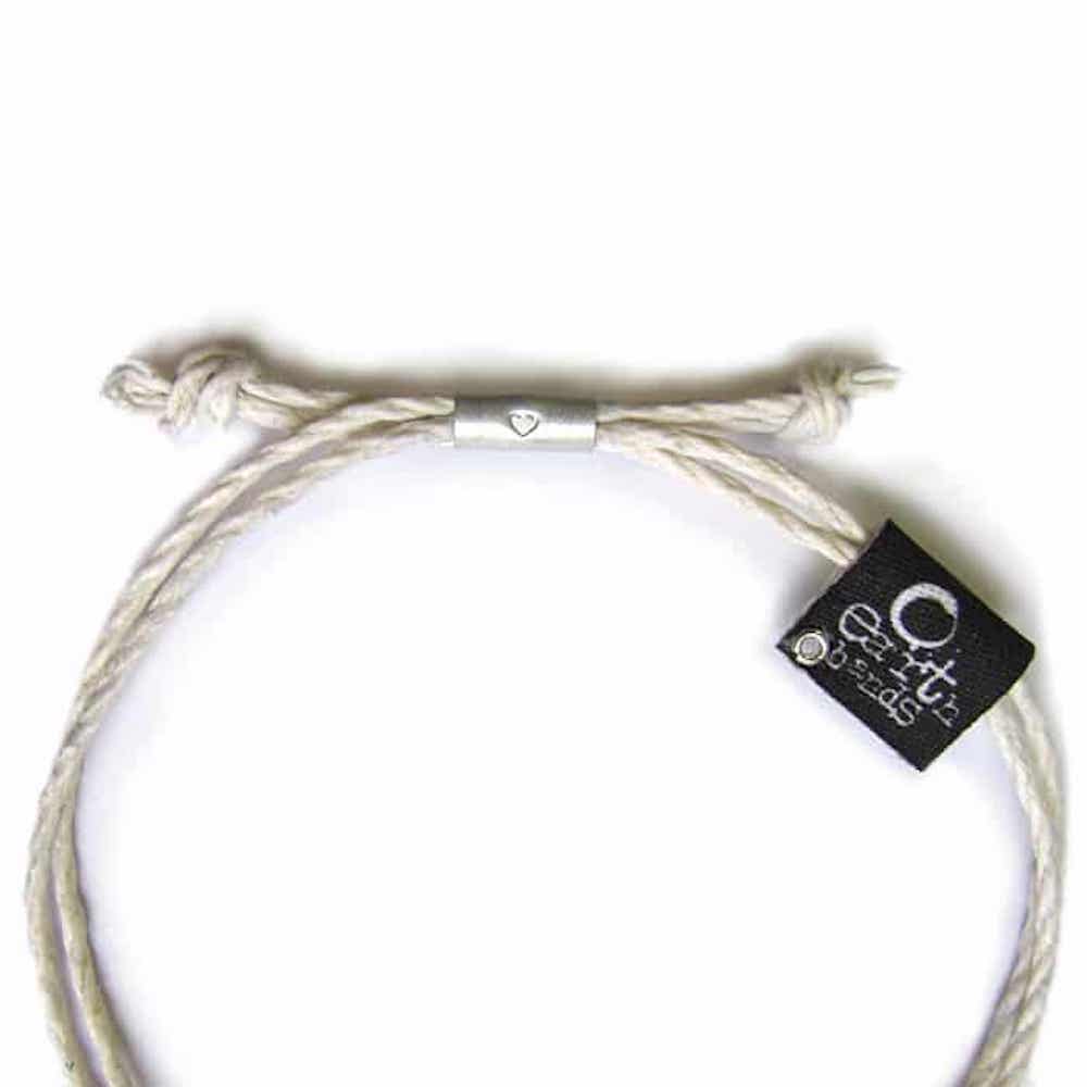 Bracelet with a tag on a white background
